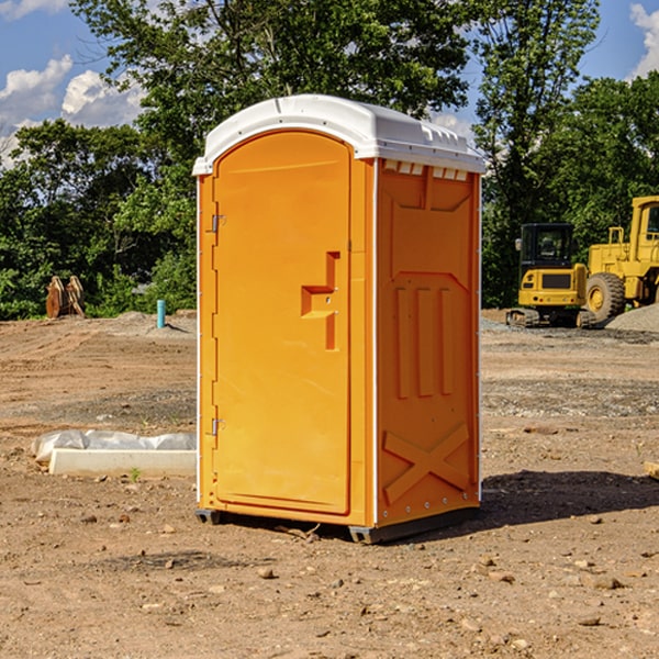 how often are the portable restrooms cleaned and serviced during a rental period in Walker KS